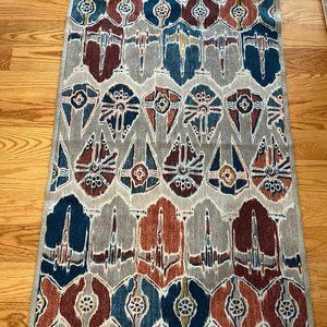 Geometric Patterned Rug in Blue, Red, and Gray